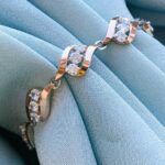 Браслет срібний з золотом і круглими камінчиками