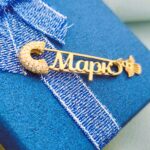 Шпилька срібна Марк з позолотою і ангелом